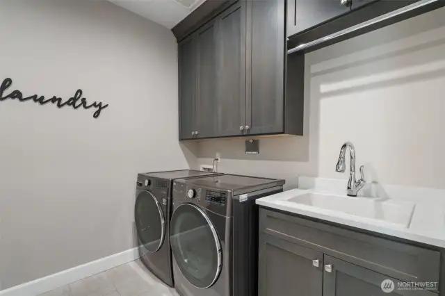 Laundry room with sink and tons of storage