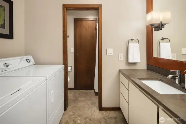 Second bathroom with its own set of washer/dryer.
