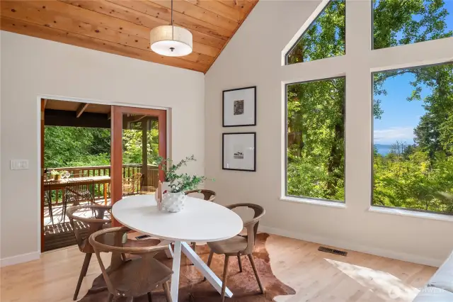 Double outswing french doors open up to the deck on the southern side of the house.