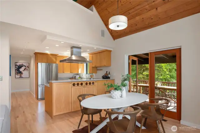 This shot shows the open loft just above the kitchen. Just refinished maple hardwood floors gleam down the hall.