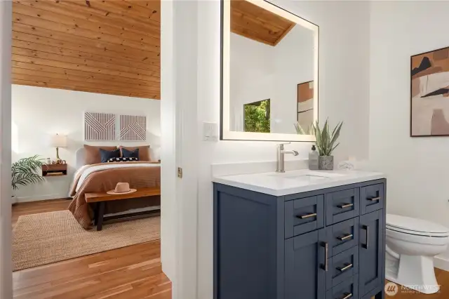 Just off the primary is this ensuite with separate tub and shower.