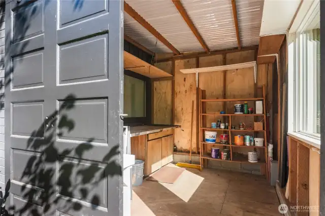 This large shed is located under the deck and is in addition to the large storage room inside the house.