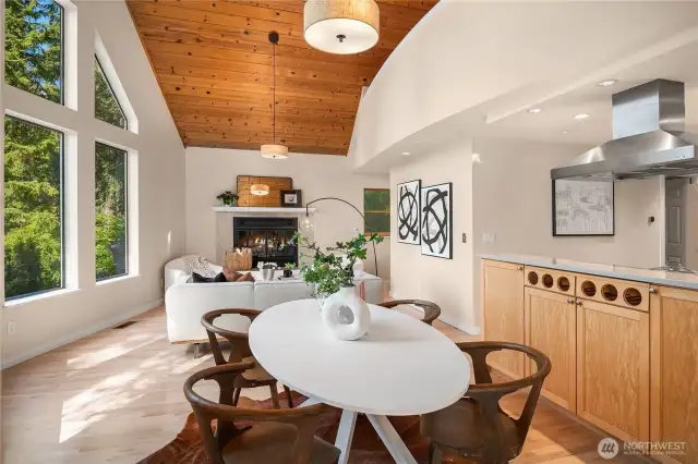 This shot shows the kitchen is open to the main dining room and living rooms.