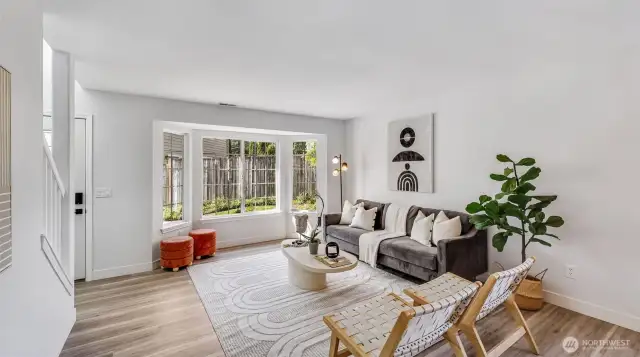 Natural light fills the home, while the layout offers a sense of privacy and space.