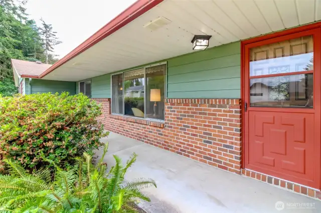 Beautiful covered front patio, bring your favorite HGTV decorating ideas!