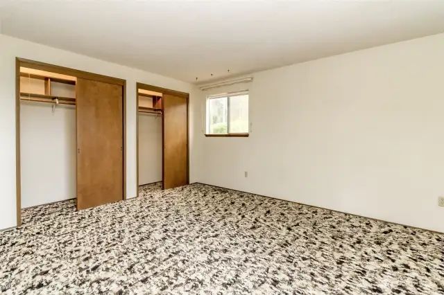 Big primary suite with two lighted closets.