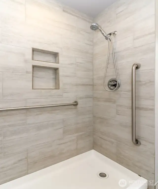 Main bathroom with updated step in shower.