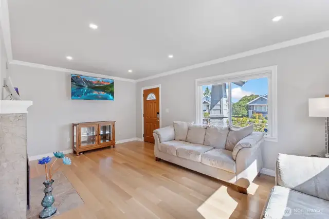 Large newer double paned windows for a bright room during the day and recessed lighting as needed when the sun goes down.