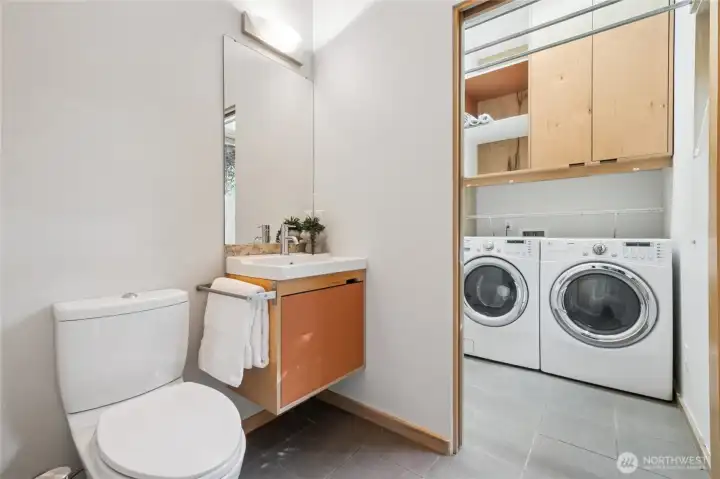 Half bath and adjacent laundry, main level.