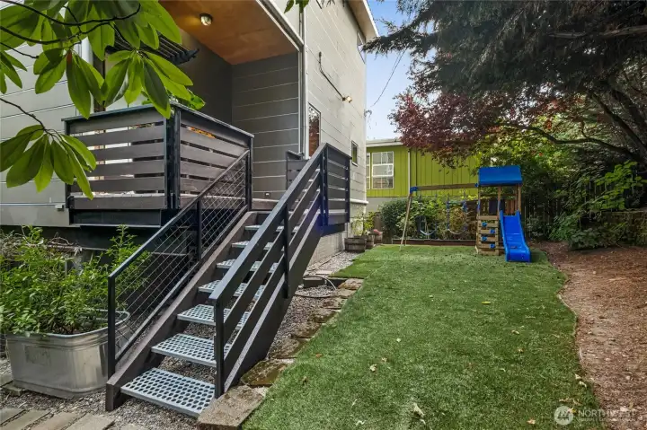 West Entry, main door. This turf is laid over a stone patio and can be removed.