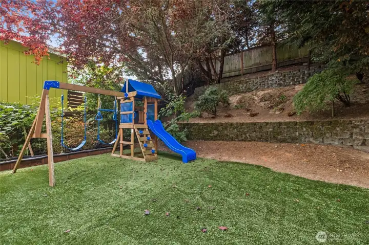 West side of property, fully secluded. The turf is laid over a stone patio and can be removed.