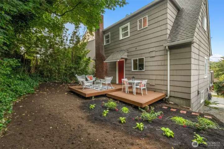 Cooling, private back deck perfect for summer dinner parties and a lush shade garden - we've already got you started with some cheery hostas, fuschias, and more!