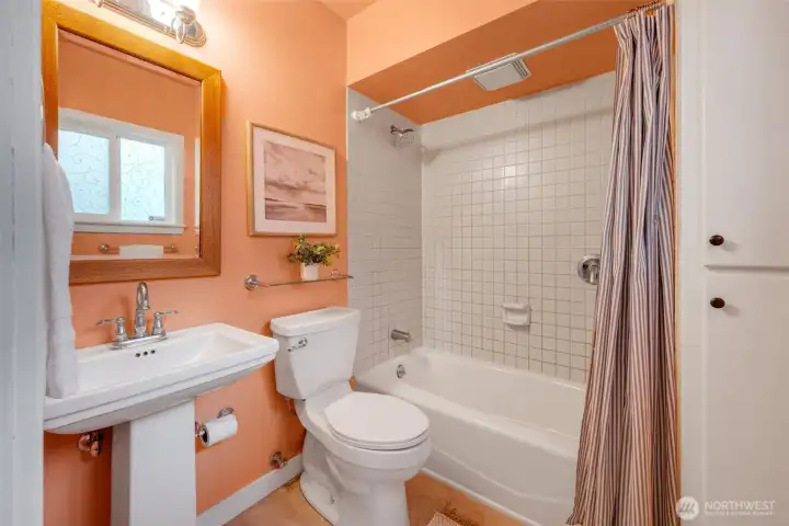 Full bathroom upstairs + half bath on main floor.