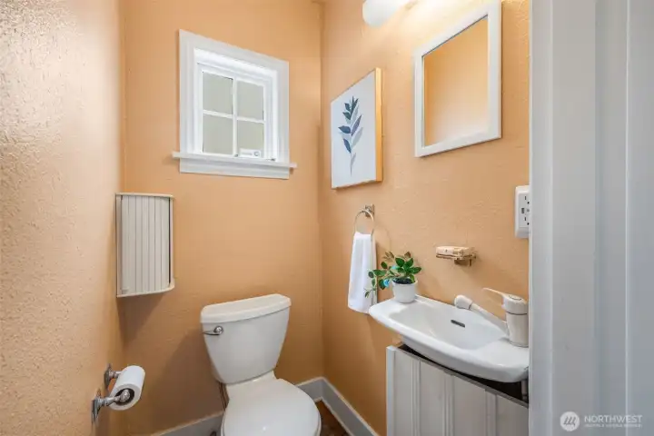 Full bathroom upstairs + half bath on main floor.
