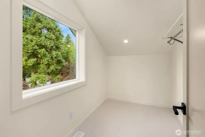 Spacious walk-in closet in third floor bedroom
