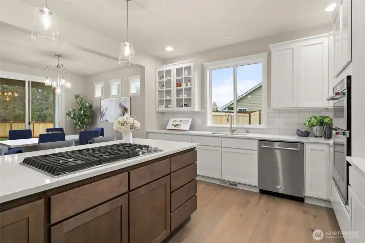 Home is under construction. Photos of a previously built home with similar finishes that are virtually staged. Builder reserves the right to make changes to plans & specifications without notice. Features vary by plan. Buyer to verify square footage.