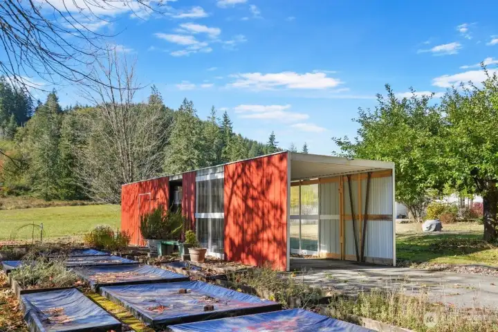 Two car carport and garden beds