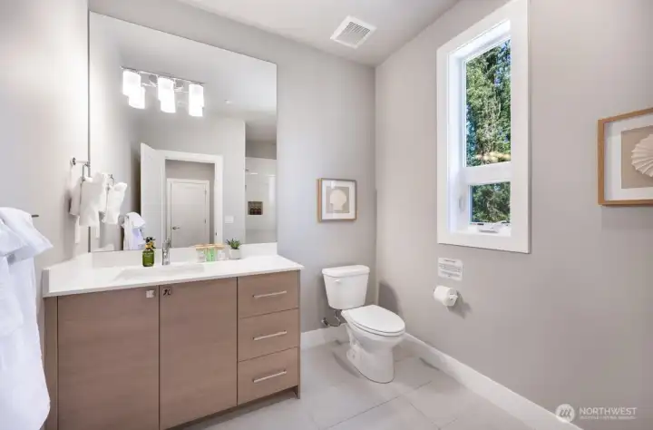 Main floor bathroom with shower