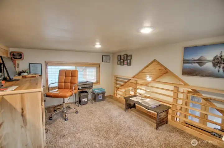 UPSTAIRS SPLIT LOFT ONE SIDE IS CURRENTLY AN OFFICE THE OTHER IS A BED