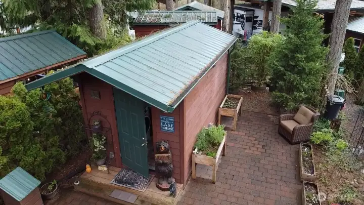 SHED IN THE BACK OF THE PROPERTY WITH WASHER/DRYER FREEZER