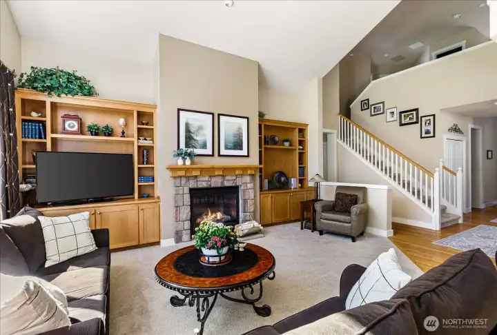 Spacious living room with abundant natural light and a comfortable flow