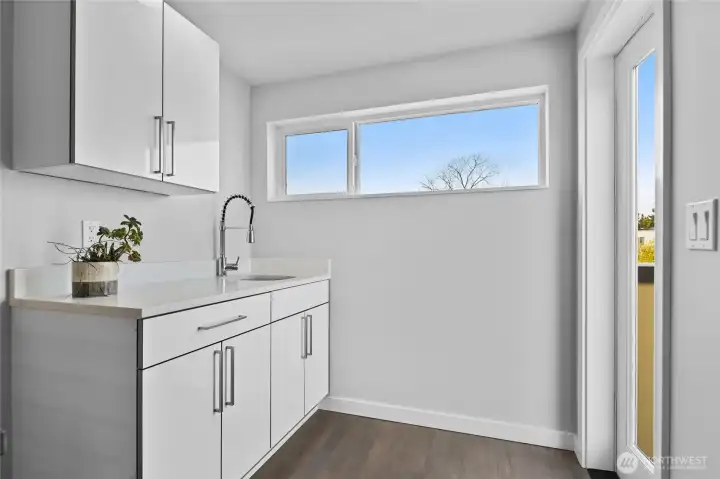 Sink and storage for rooftop deck entertaining.