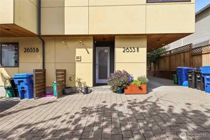 Convenient alley parking adjacent to back door.