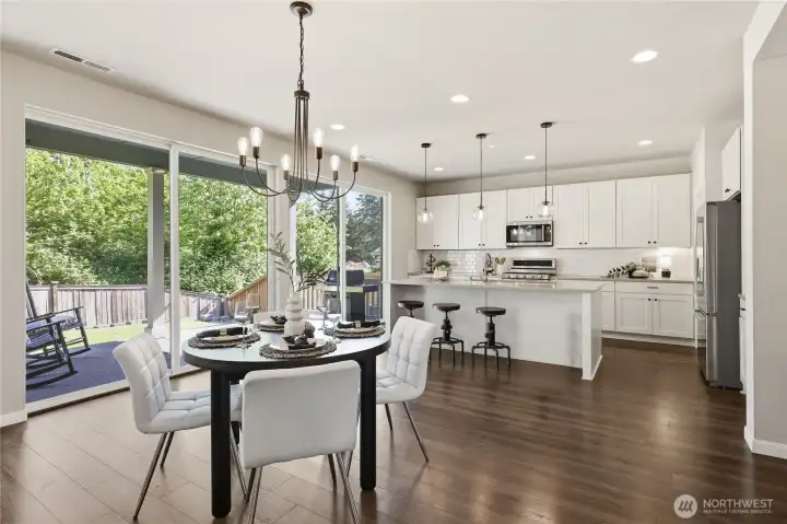 The well-appointed kitchen features abundant storage, a spacious walk-in pantry, and a large island perfect for casual dining, homework, or weekend brunch. The well-appointed kitchen features abundant storage, a spacious walk-in pantry, and a large island perfect for casual dining, homework, or weekend brunch.