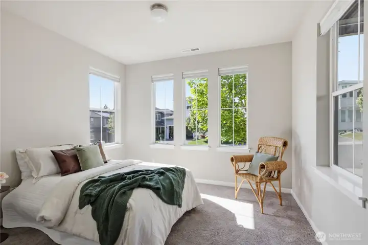 The downstairs bedroom offers a bright and comfortable space for guests or a home office. The downstairs bedroom offers a bright and comfortable space for guests or a home office.