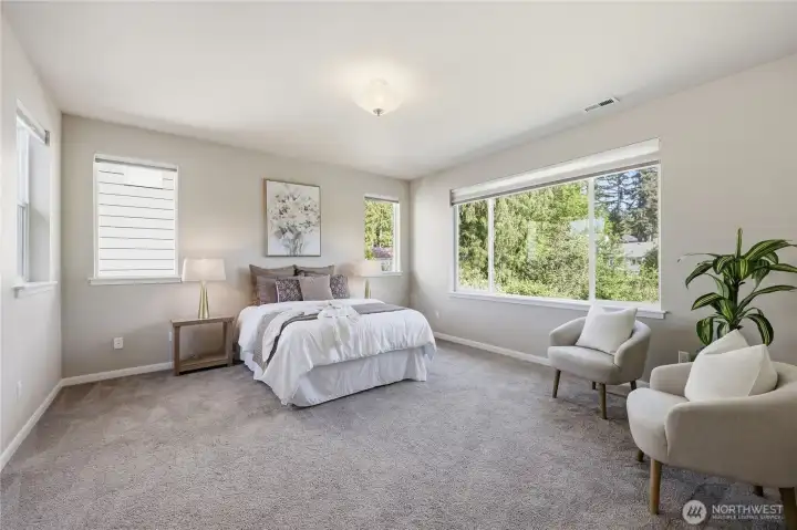 The spacious primary suite offers a true retreat, featuring a luxurious five-piece ensuite bath, generous walk-in closet, and top-down/bottom-up shades for the perfect balance of natural light and privacy. The spacious primary suite offers a true retreat, featuring a luxurious five-piece ensuite bath, generous walk-in closet, and top-down/bottom-up shades for the perfect balance of natural light and privacy.