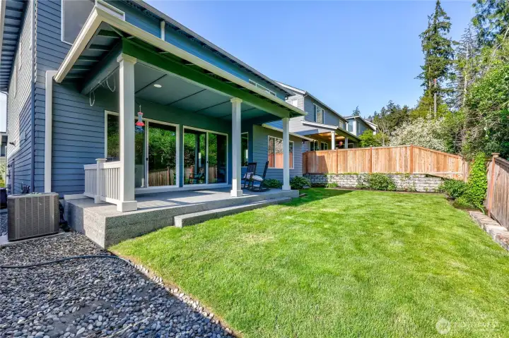 Clean and simple landscaping offers a blank canvas for your personal touch and outdoor vision. Note the heat pump for air conditioning on those hotter days. Clean and simple landscaping offers a blank canvas for your personal touch and outdoor vision. Note the heat pump for air conditioning on those hotter days.