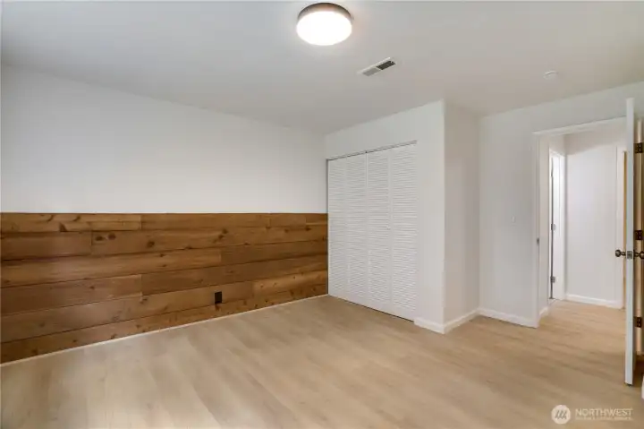 Den (with closet!) on lower level. This room has a full sized window.
