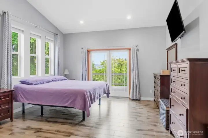 Primary Bedroom with french door to the back porch