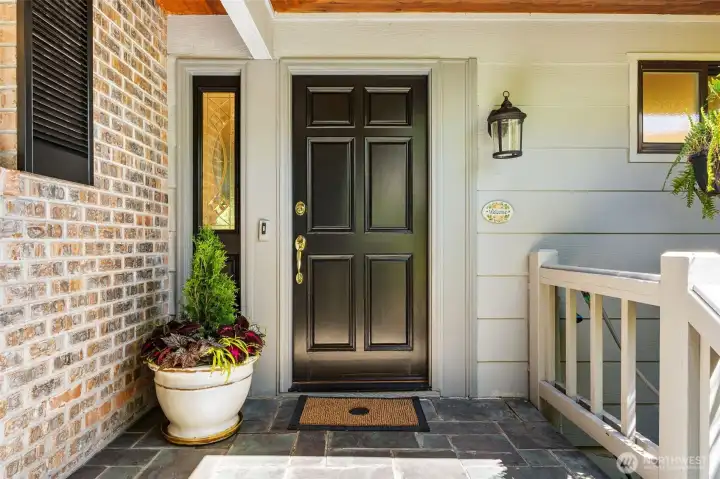 Beautiful front proch is warm and inviting