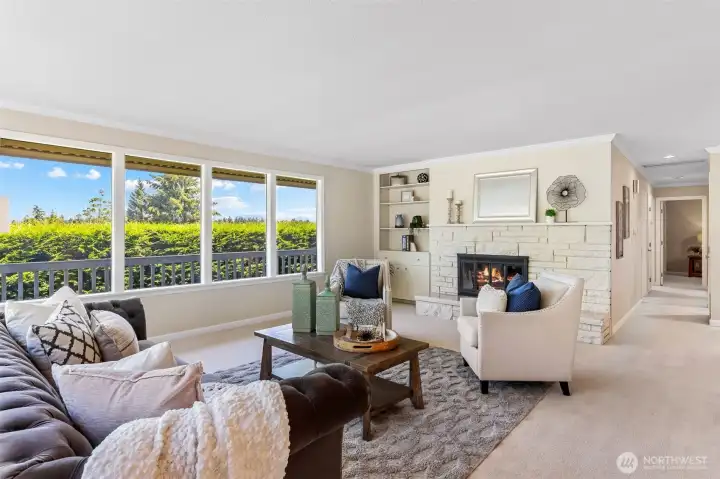Gas fireplace creates ambiance and this room invites you to settle in