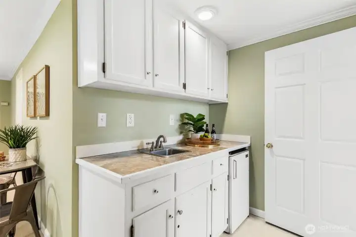 Even a kitchenette which makes popcorn and movies even better