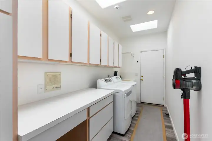 Laundry room with skylights door leads to 3 car garage no steps to garage.