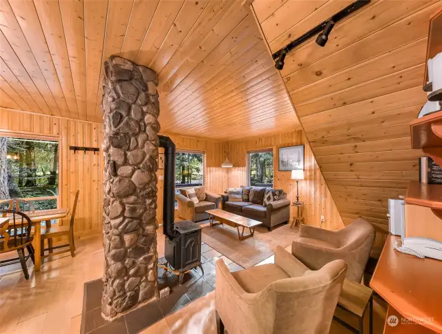 Entertaining space centered around this beautiful rock wall and fireplace