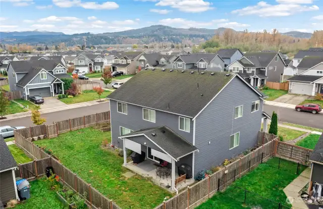 Fully Fenced back yard with large patio.