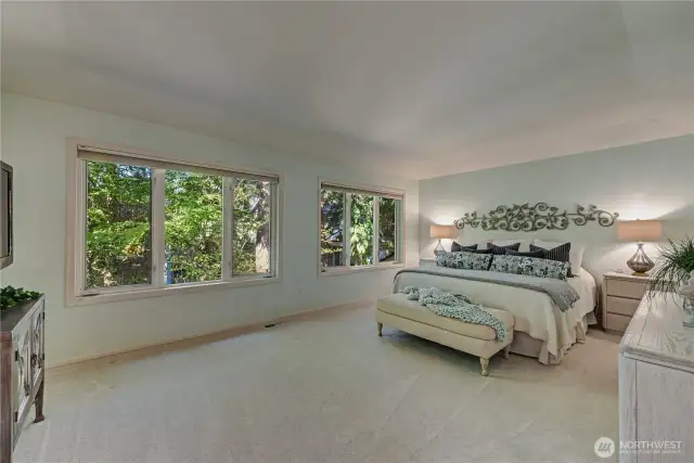 Large primary suite with 5 piece bathroom & walk-in closet.