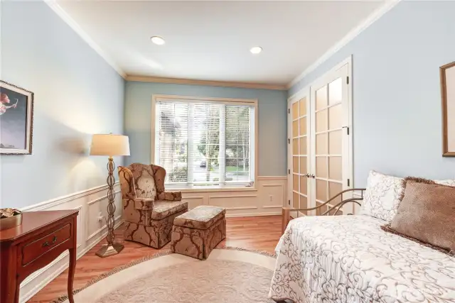 Office/Den with French Doors, wainscoting & crown molding.