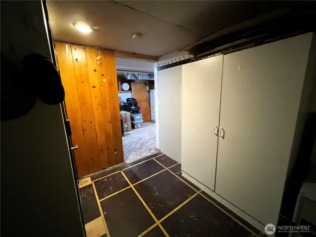 Another Area of Basement with Floor to Ceiling Storage Cabinets