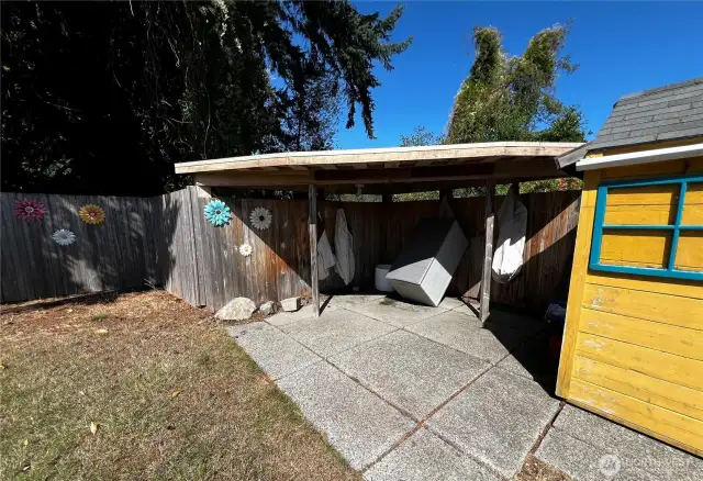 Covered Area next to Garden Shed for Storage or Whatever