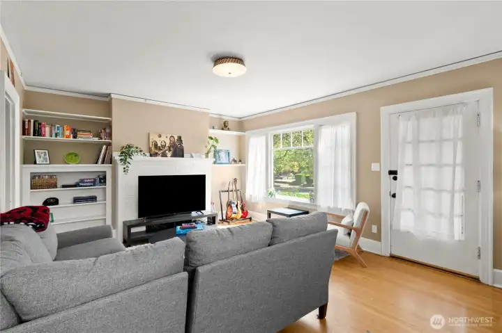 Light filled living room with hardwood floors