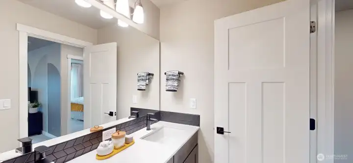 Photo is of a model home in another KB Home location; options and colors may vary based on your selections. Depictions of home, layout, location or other features/options, colors and color scheme, materials, fixtures, etc. are for showing purposes only and may not be included in the purchase price and availability may vary.