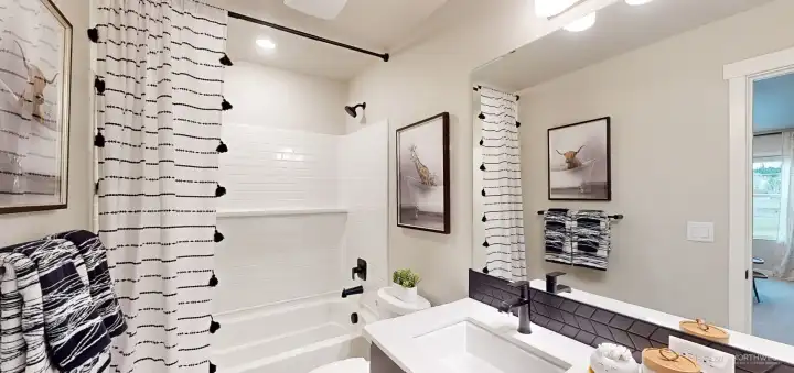 Photo is of a model home in another KB Home location; options and colors may vary based on your selections. Depictions of home, layout, location or other features/options, colors and color scheme, materials, fixtures, etc. are for showing purposes only and may not be included in the purchase price and availability may vary.