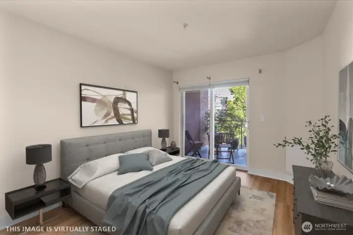Bedroom with door to balcony.