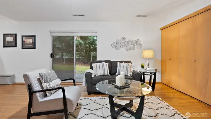 The sliding glass door opens to a fully fenced backyard that’s ready for outdoor fun. Morning coffee on the deck, an evening BBQ, or a game of fetch with Fido - it’s all right here, just steps from the living space.