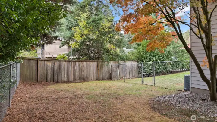 Pawsitively perfect! This fenced yard is ideal for four-legged friends to explore and play, with plenty of room left for relaxing or weekend get-togethers.