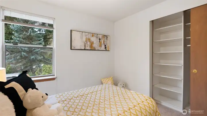 The closet includes built-in shelving and organizers, giving you instant, practical storage without any extra effort. Everything has a place the moment you move in.